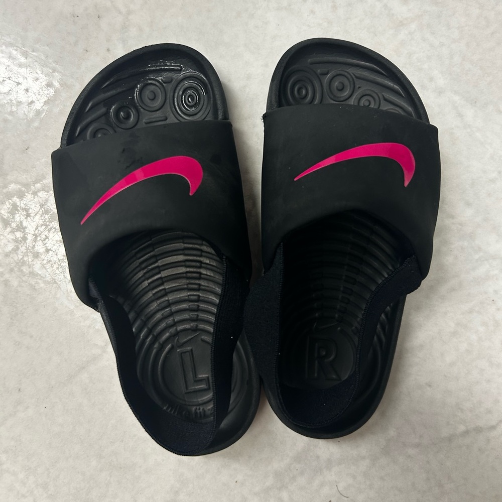 Nike Kids Black Slide Sandals with Pink Swoosh Accent
